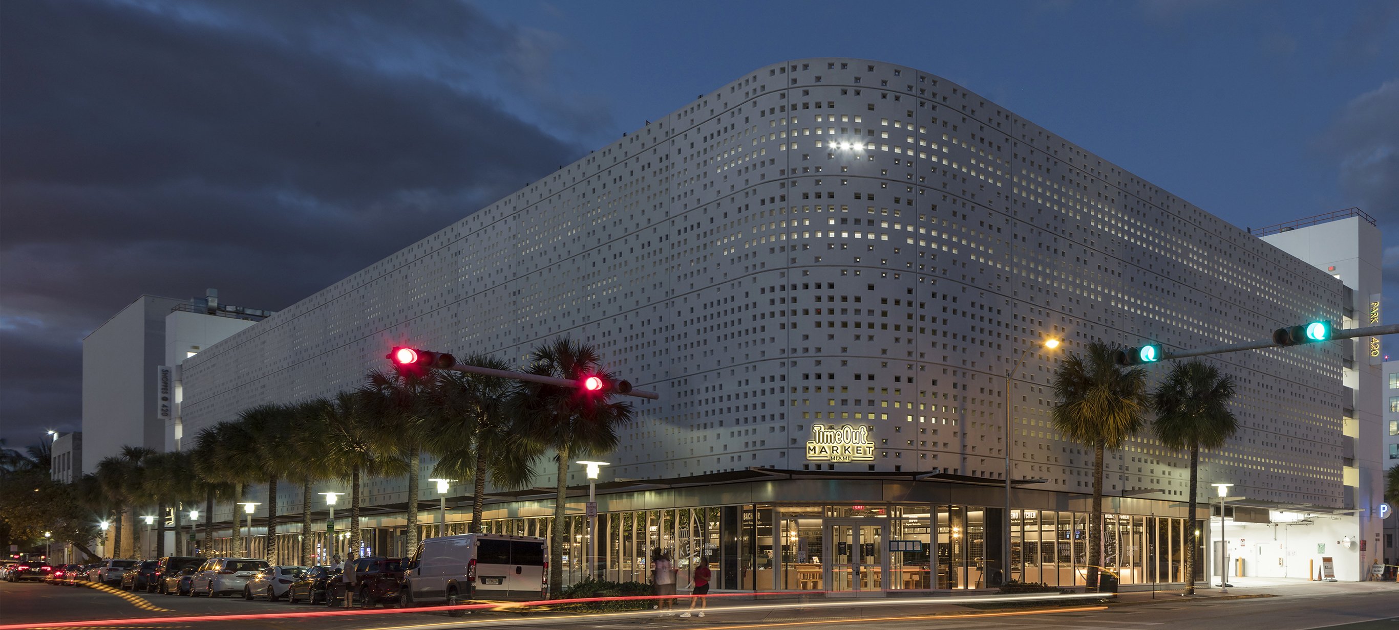 Time Out Market Miami building lit up at night