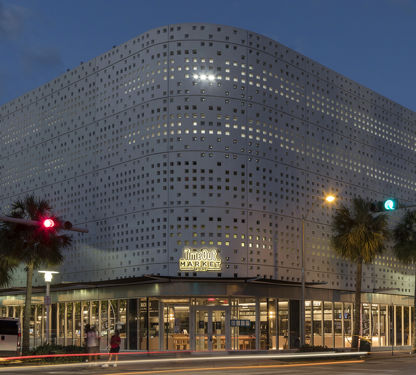 Time Out Market Miami building lit up at night