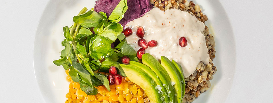 BKLYN Wild bowl with avocado and pomegranate seeds